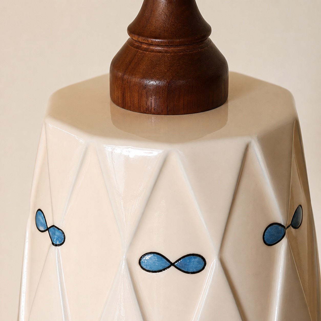 close view of diamond ceramic shade and blue petal detail